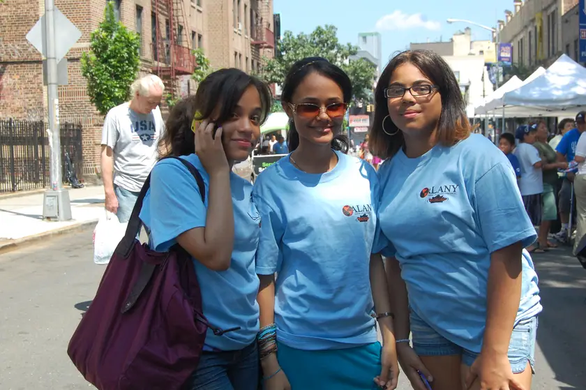 Volunteers working the outreach table