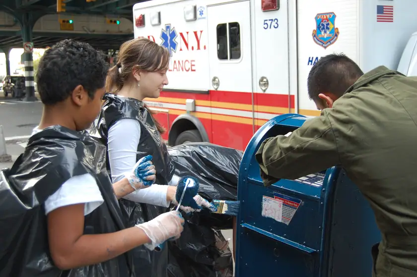 Work carries on as the ambulance goes by