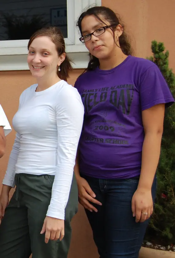 A mentor and mentee on service day