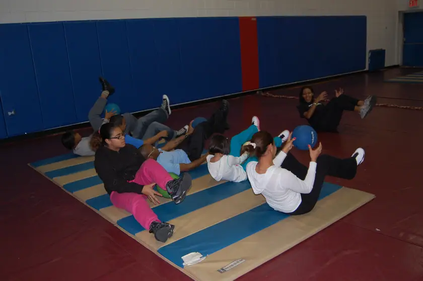Mat work with medicine balls
