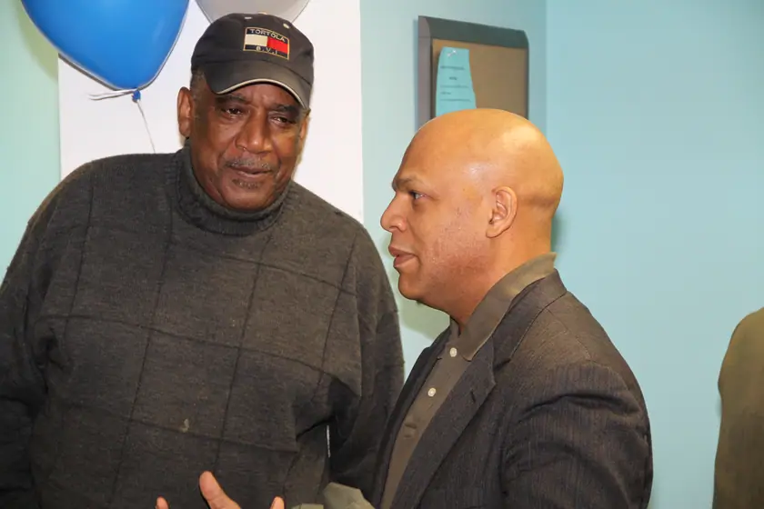 Two supporters in conversation